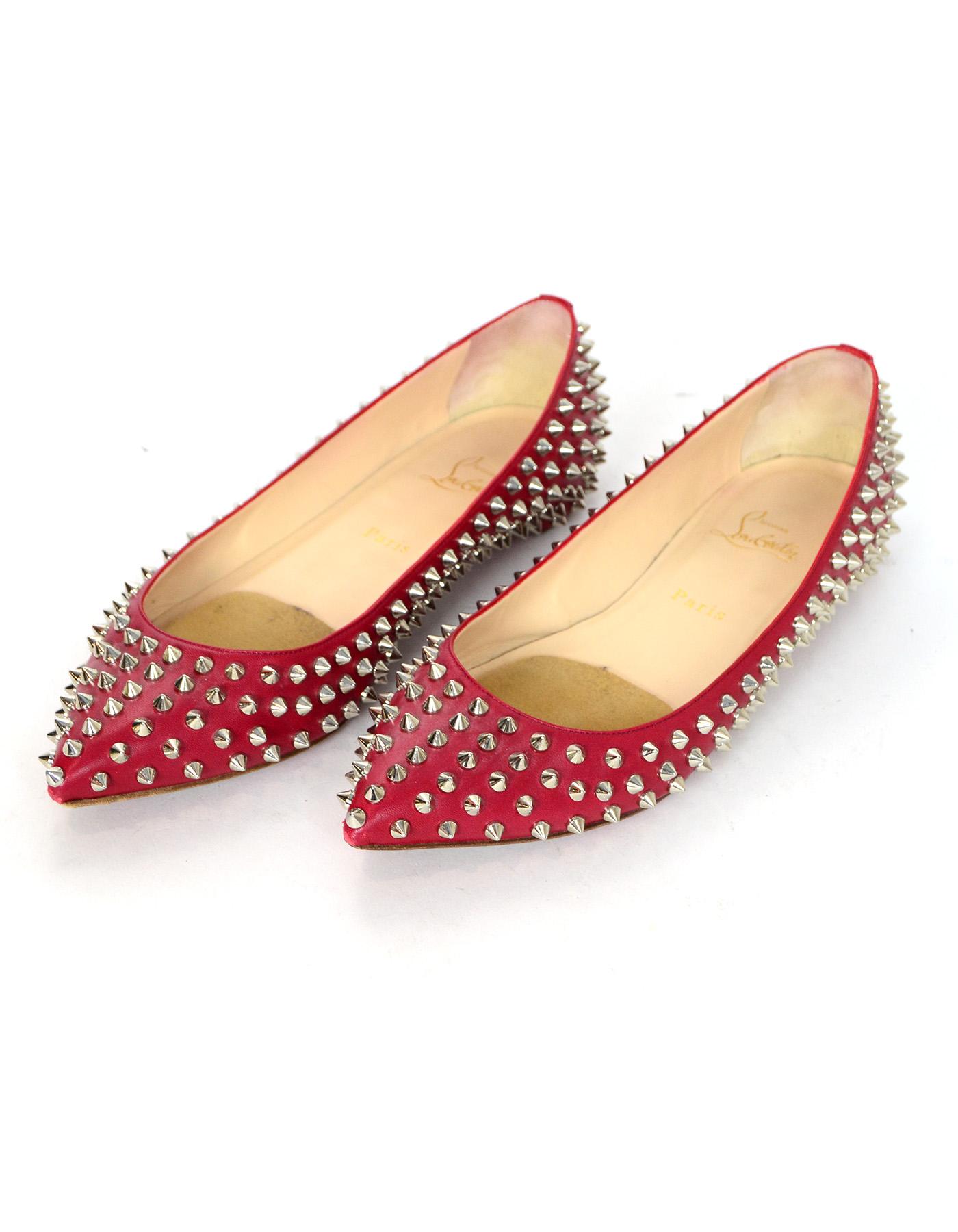 red bottom flats with spikes