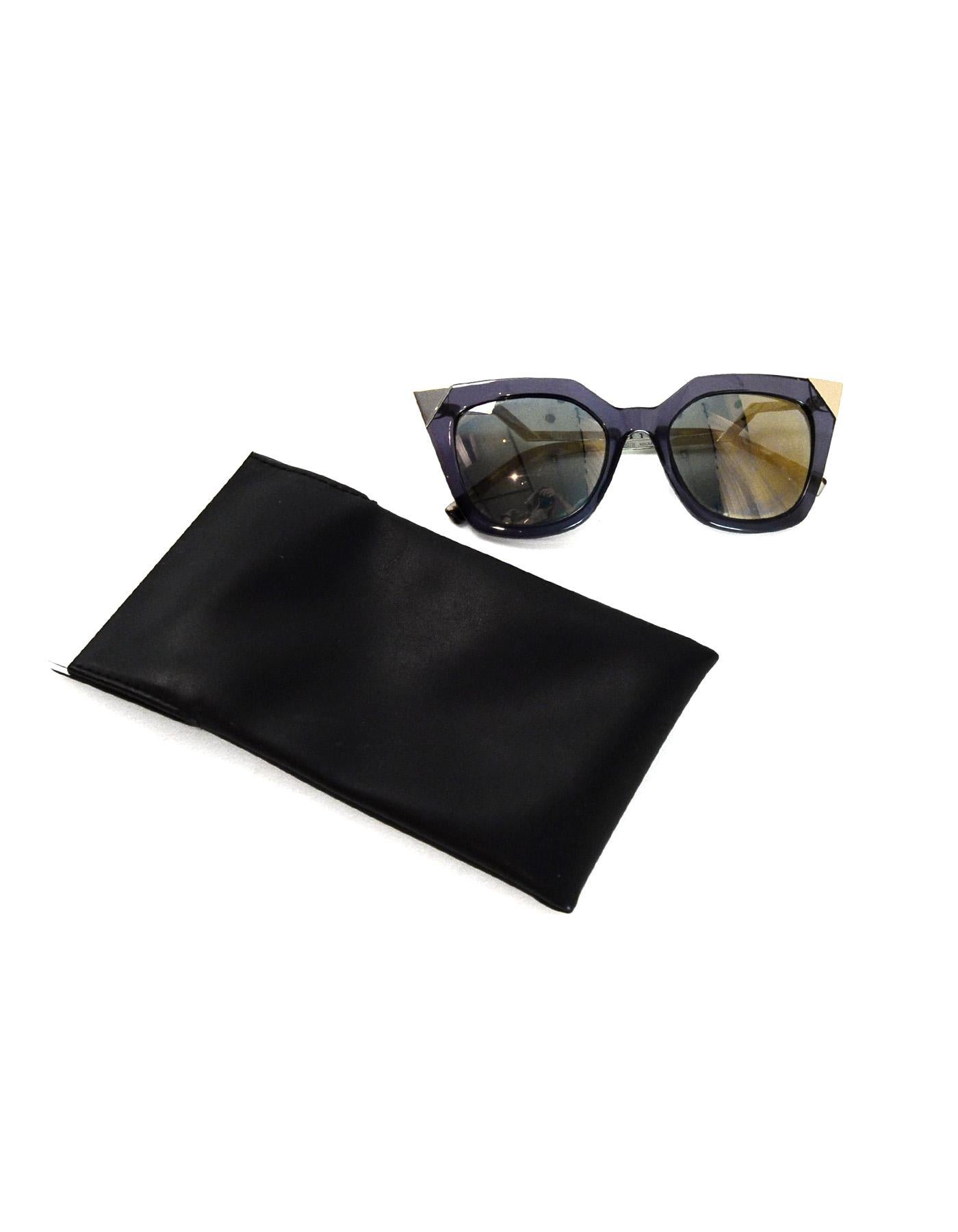 Fendi Blue Iridia Metal Tip Cat Eye Sunglasses W/ Goldtone Mirrored Lenses, Yellow Zig Zag Arm W/ Logo & Crystals. Comes with soft leather Fendi case.

Made In:  Italy
Color: Blue, goldtone, yellow
Hardware: Goldtone
Materials: Resin, metal,