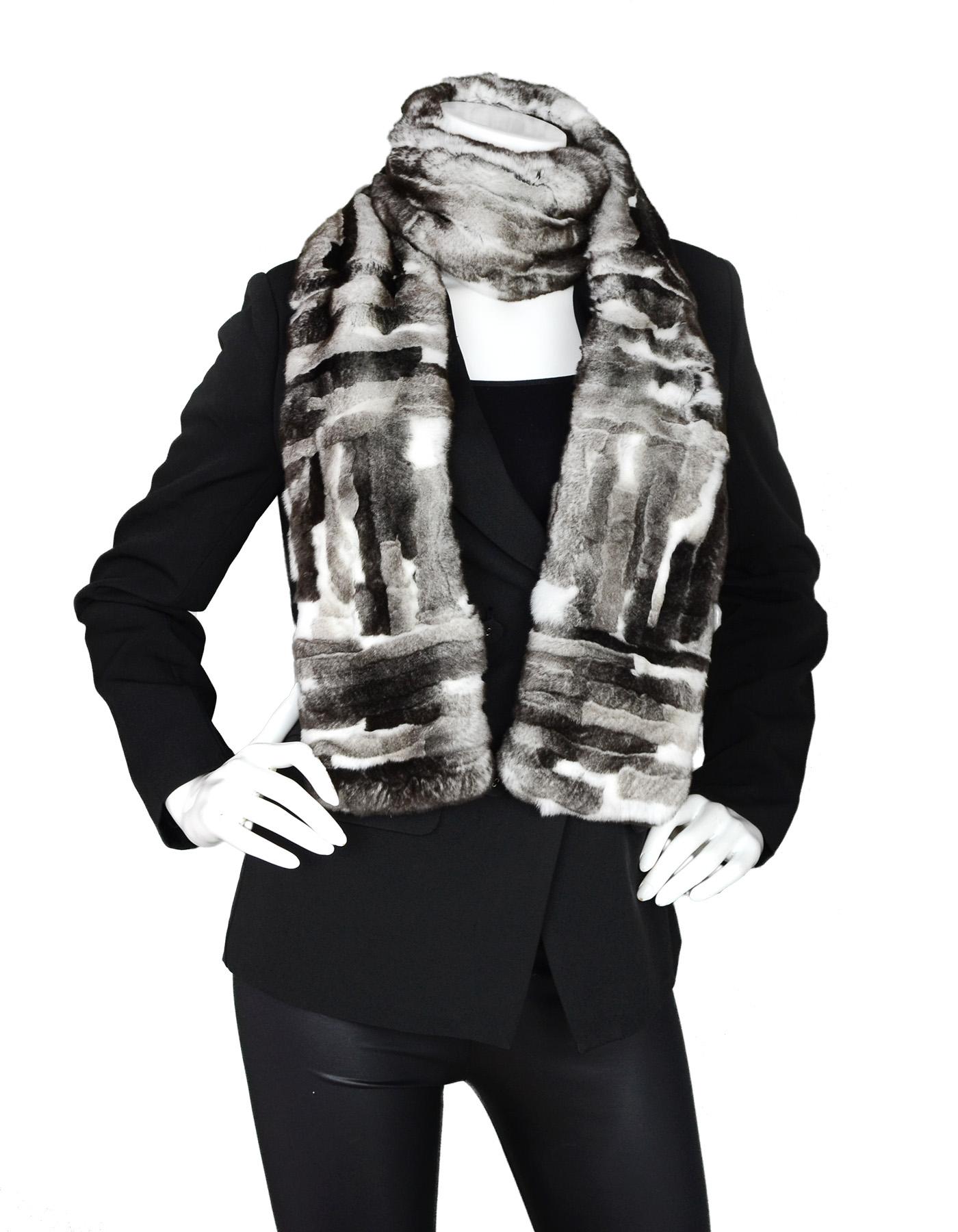Chanel Grey Cashmere CC Print Rabbit Fur Stole Scarf

Made In: Italy
Color: Grey
Materials: 100% cashmere and rabbit fur
Overall Condition: Excellent pre-owned condition 
Estimated Retail: $1,875 + tax

Measurements: 
5.25