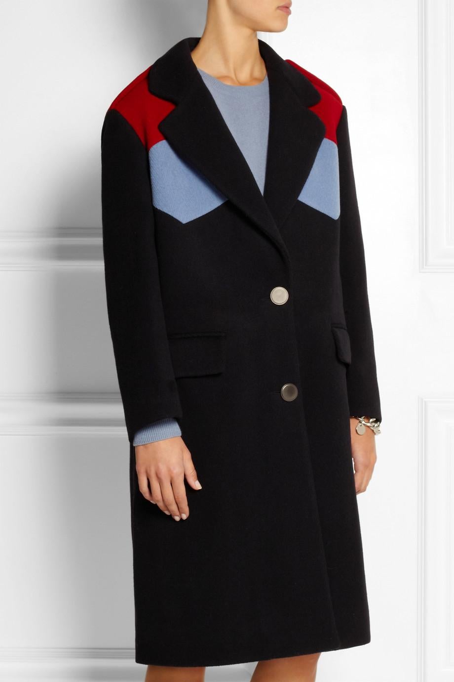 Miu Miu Navy/Light Blue & Red Color Block Wool Coat Sz IT36

Made In: Italy
Year of Production: 2014
Color: Navy/Light Blue & Red
Materials: 100% virgin wool, hood- 100% nylon, 
Lining: 100% viscose, interlining- 100% polyester
Opening/Closure: