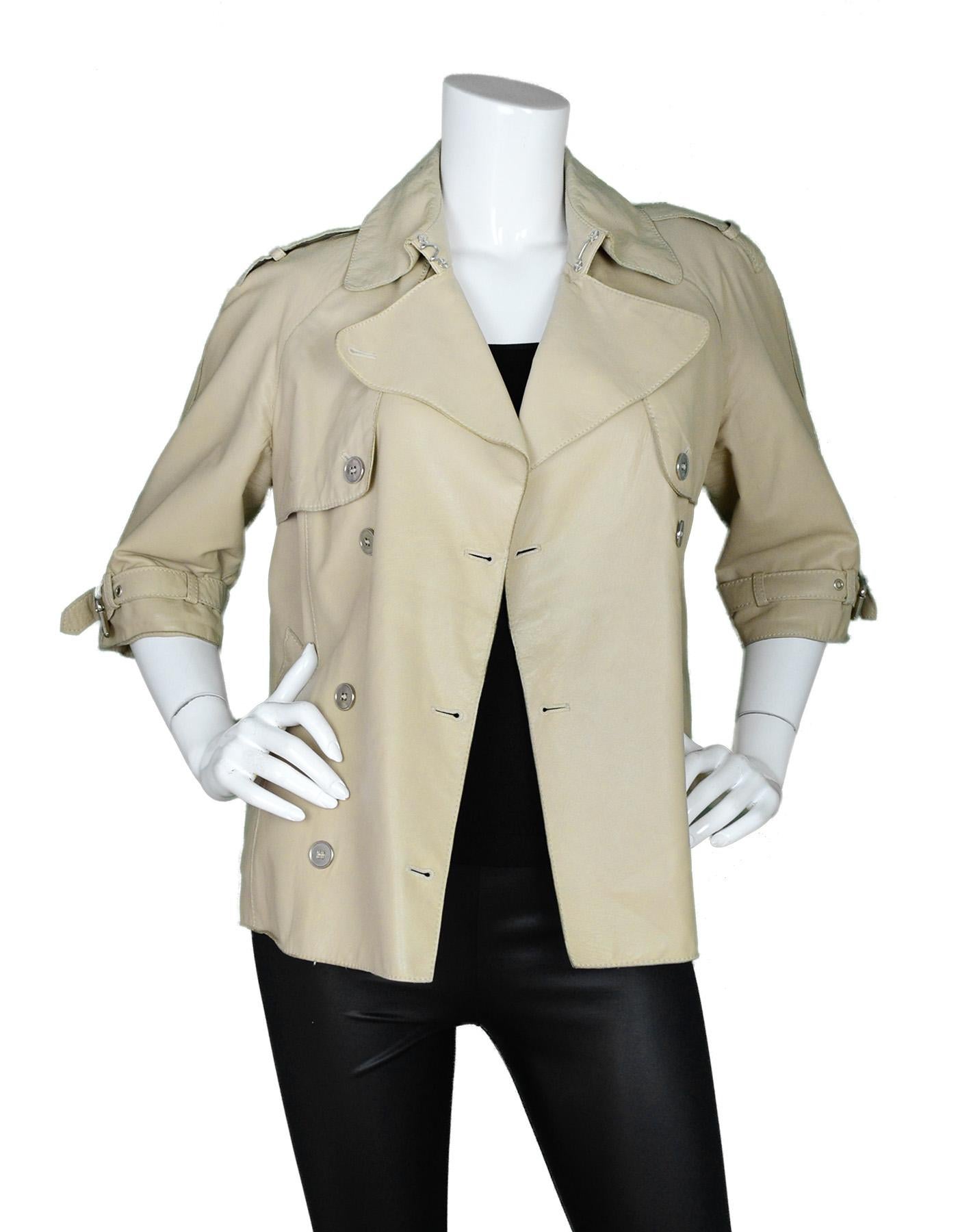 Dolce & Gabbana Beige Leather Double Breasted Jacket W/ 3/4 Sleeves Sz 40

Made In: Italy
Color: Beige
Materials: 100% lambskin 
Lining: 100% silk
Opening/Closure: Double breasted button front
Overall Condition: Good pre-owned condition, has marks