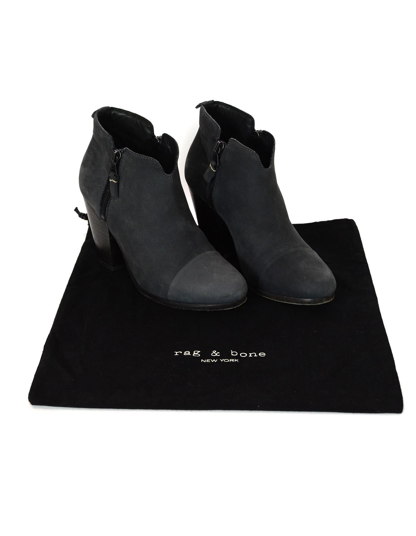 Rag & Bone Grey Suede Ankle Booties Sz 38

Made In: U.S.A
Color: Grey
Hardware: Antiqued silver/grey 
Materials: Suede
Closure/Opening: Two side zippers
Overall Condition: Excellent pre-owned condition with exception of minor scratching throughout