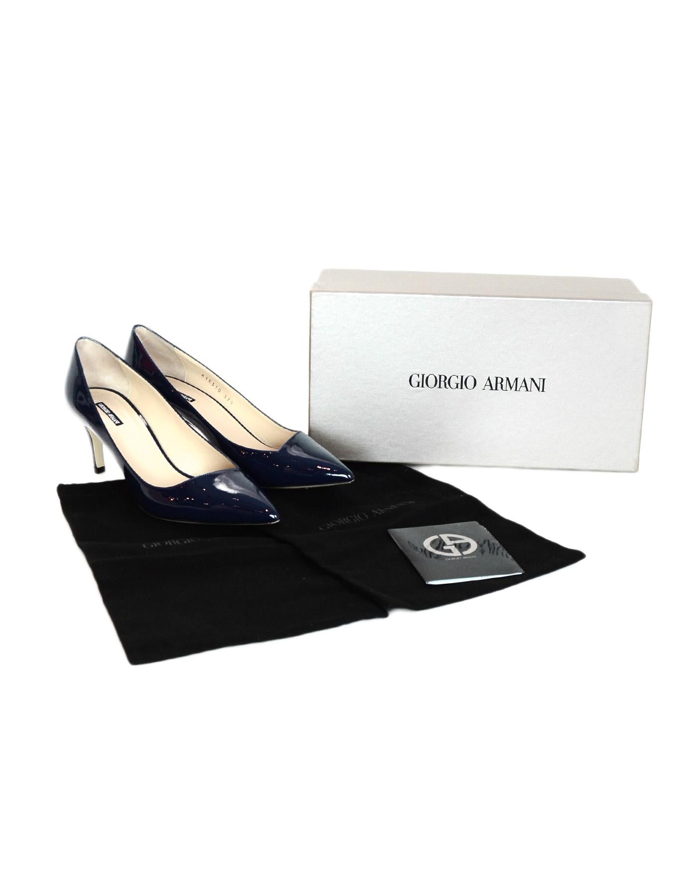 Giorgio Armani Navy Blue Patent Leather Point Toe Pumps Sz 37.5

Made In: Italy
Color: Navy blue
Materials: Patent leather 
Closure/Opening: Slide on
Overall Condition: Excellent pre-owned condition 
Estimated Retail: $595 + tax
Includes: Box and