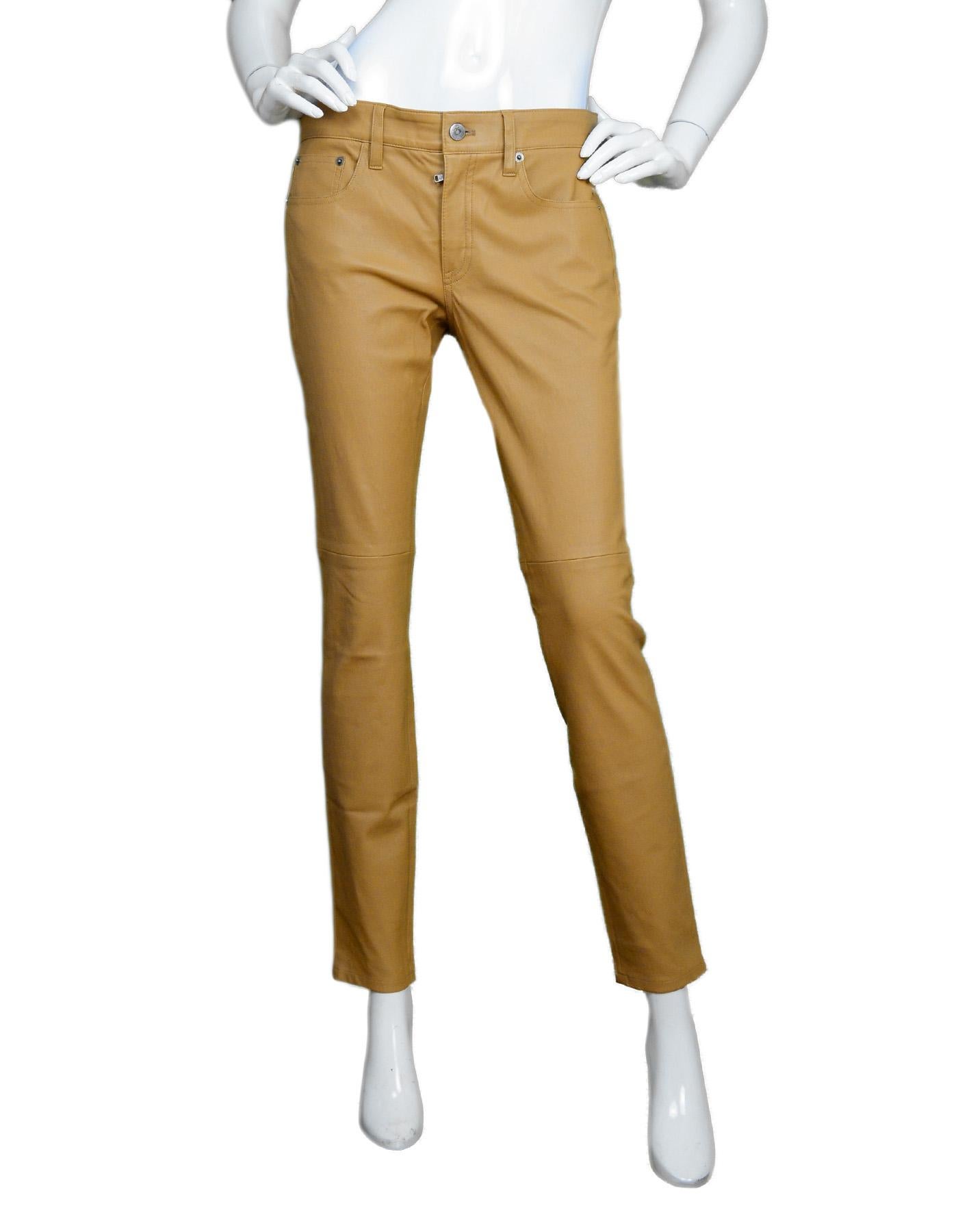 Ralph Lauren Purple Label NWT Nude/Tan Leather Skinny Slacks Pants Sz 6

Made In: U.S.A
Color: Nude/tan
Materials: 100% lambskin
Lining: 95% cotton, 5% elastane 
Overall Condition: Excellent like new condition with original tags attached 
Estimated