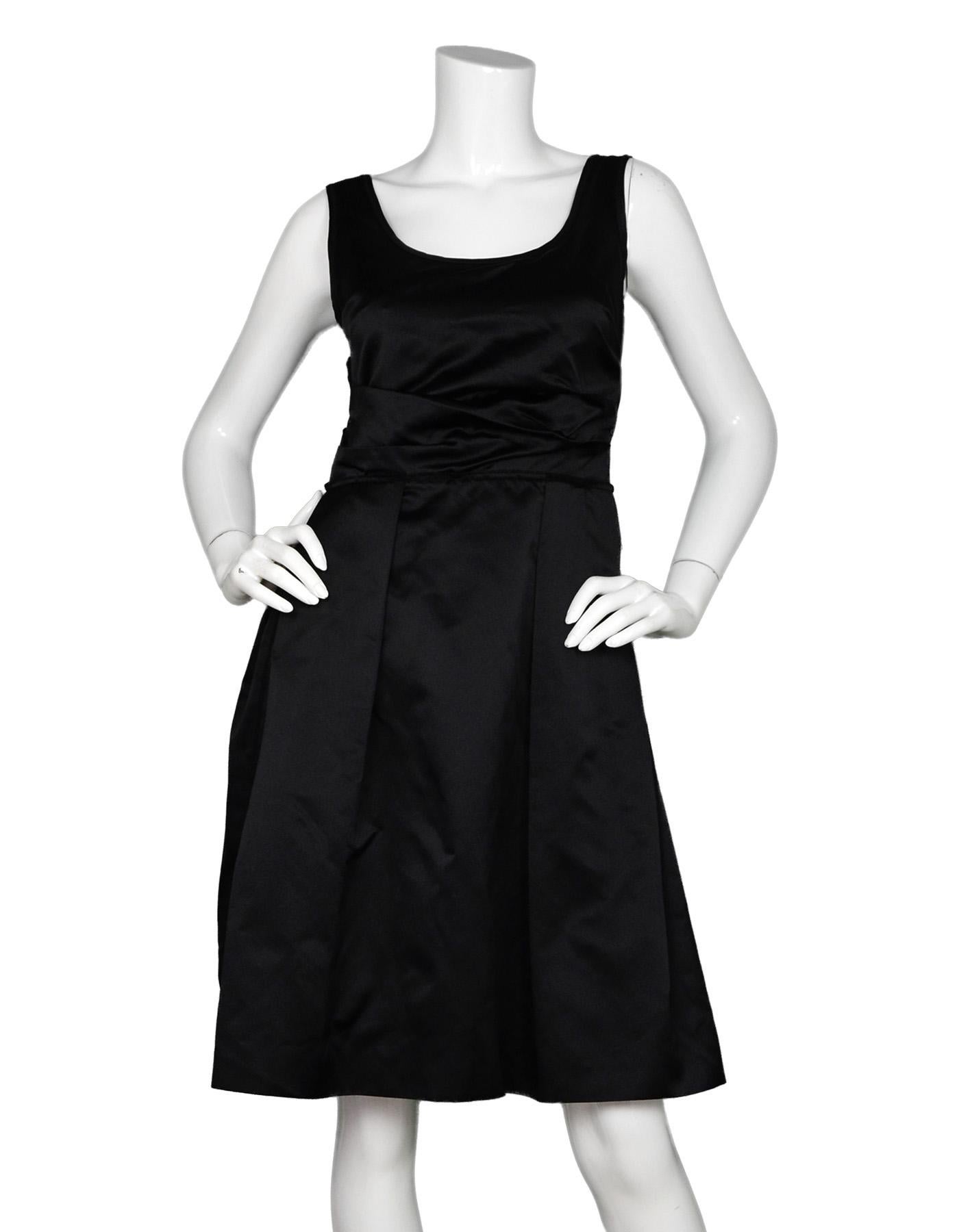 Prada Black Satin Silk Sleeveless Dress Sz 40

Made In: Italy
Color: Black
Materials: 100% silk
Opening/Closure: Exposed side zipper
Overall Condition: Excellent pre-owned condition

Measurements: 
Bust: 29