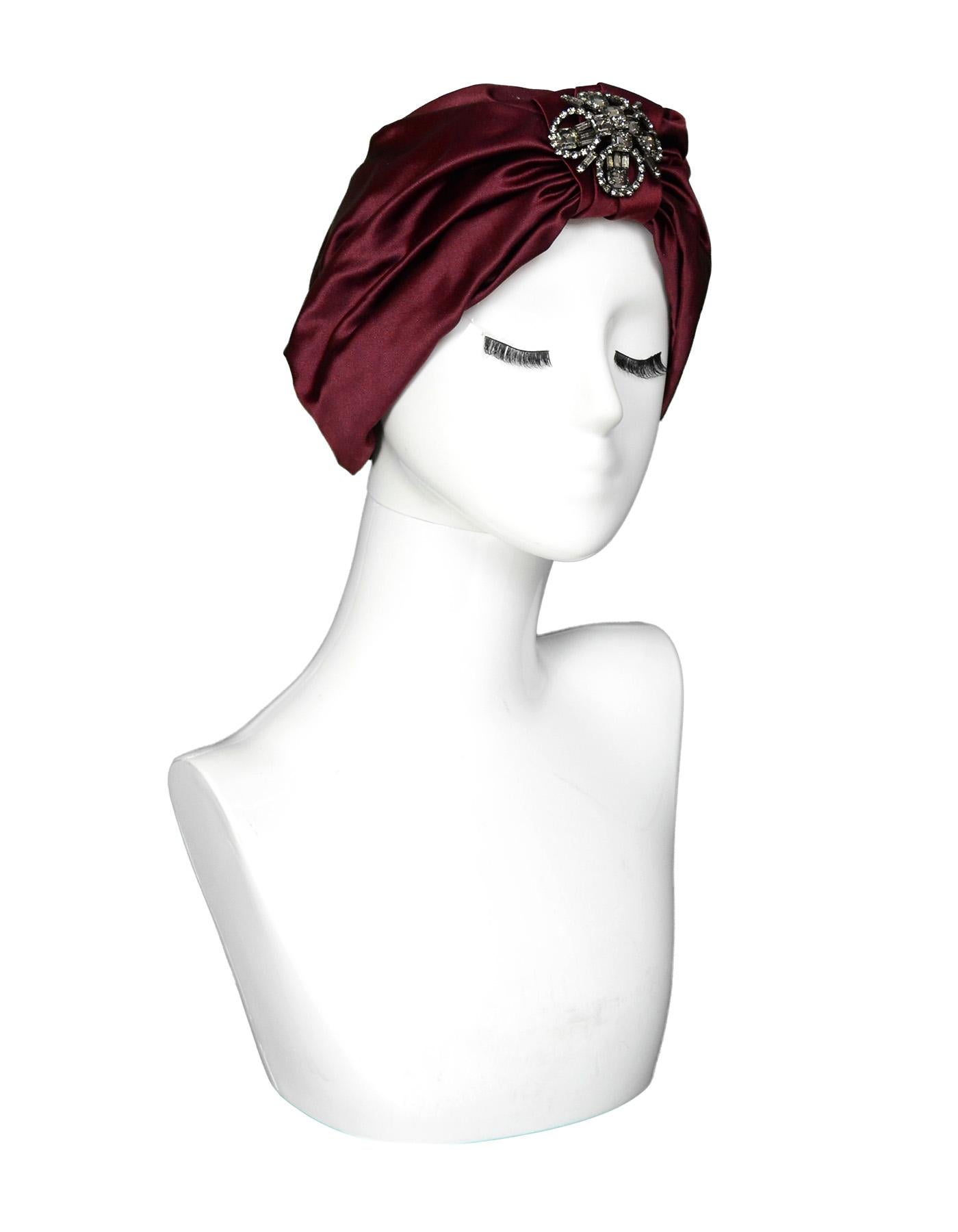 Jennifer Behr Burgundy Sateen/Crystal Sophia Turban Hat

Color: Burgundy
Materials: Sateen (no composition tag)
Retail Price: $698 + tax
Overall Condition: Excellent pre-owned condition with the exception of some marks on the inside from
