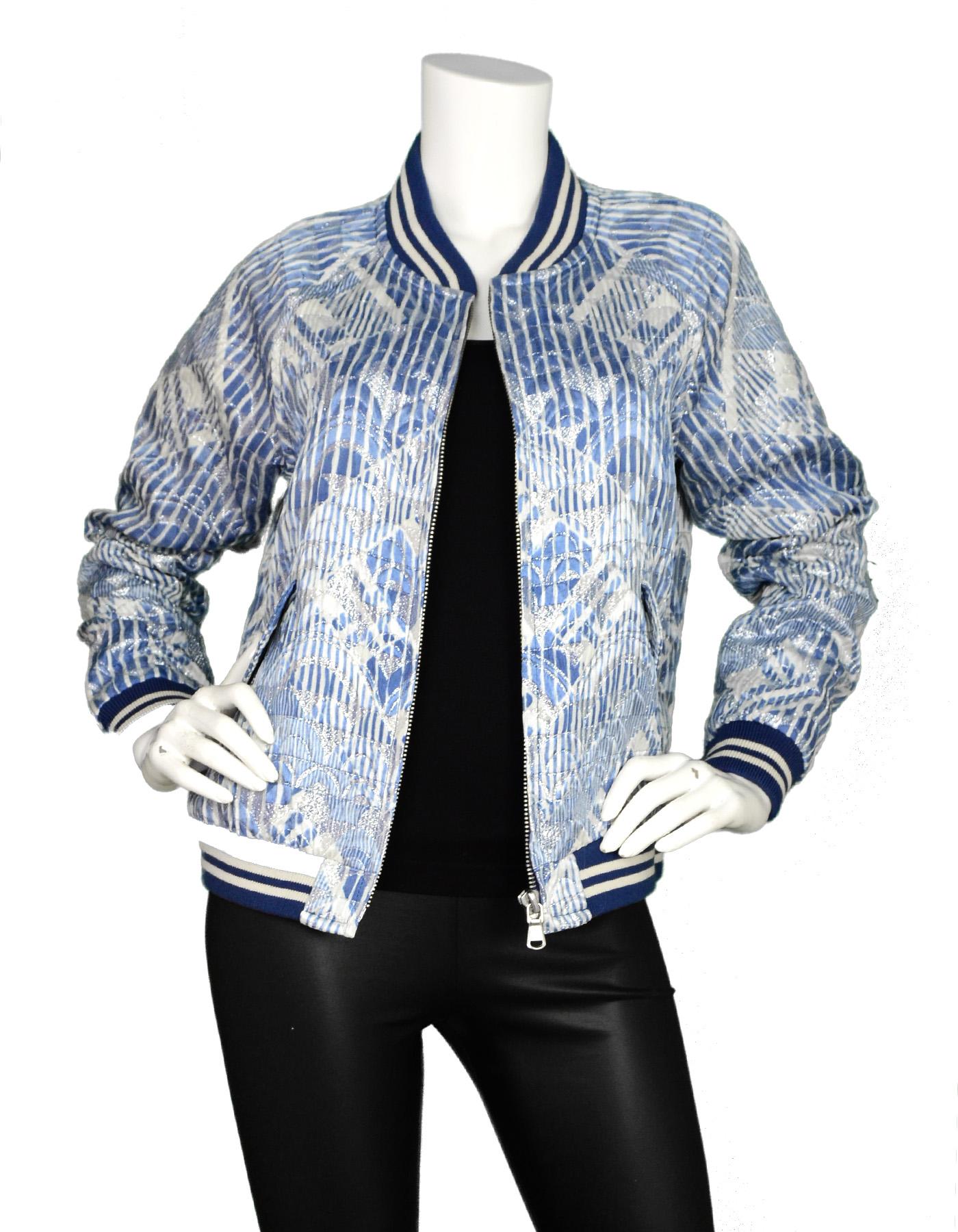 Marc Jacobs NWT Blue/White Nylon Glitter Bomber Jacket Sz M

Made In: Poland
Color: Blue/white
Materials: 95% polyester and 5% nylon
Lining: 100% polyester
Opening/Closure: Zipper front
Overall Condition: New with original tags condition 
Estimated