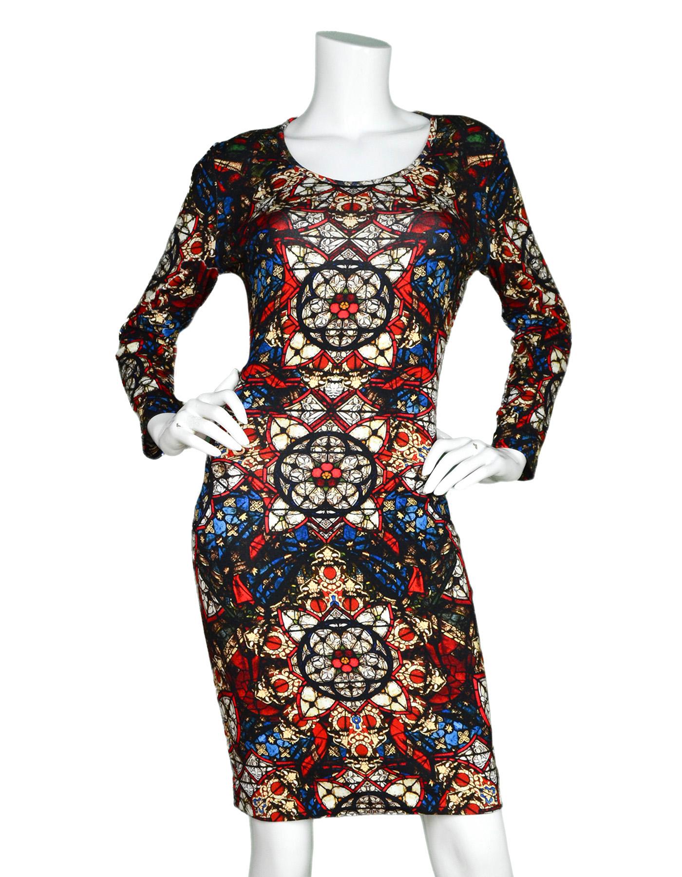 Alexander McQueen Long-Sleeve Stained Glass Print Dress Sz 42

Made In:  Italy
Color: Multicolor
Materials: 94% rayon, 6% elastane
Lining: 76% acetate, 24% silk
Opening/Closure: Hidden back zipper
Overall Condition: Excellent pre-owned condition