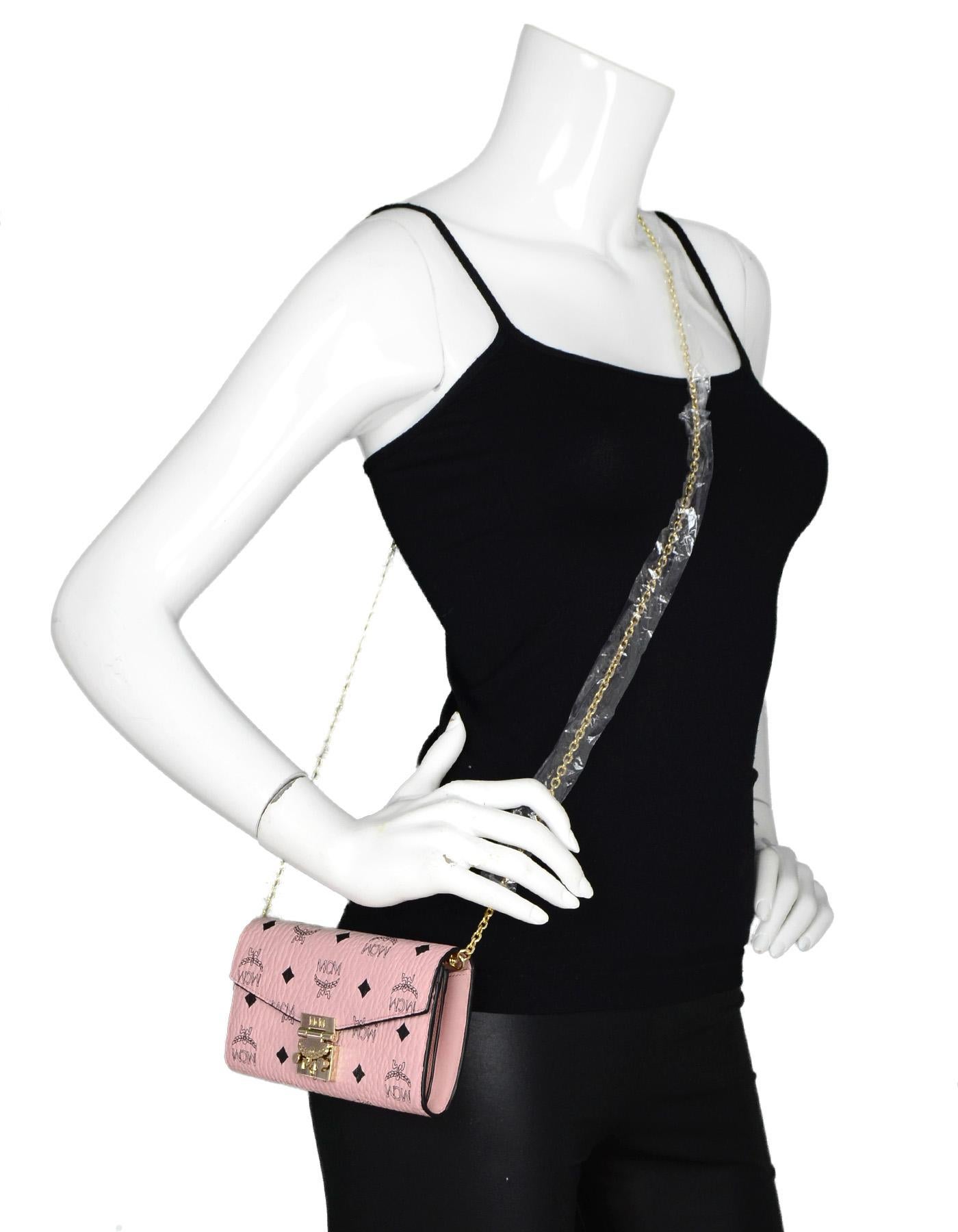 MCM Pink/Black Monogram Patricis Visetos Large Chain Wallet WOC Crossbody Bag

Made In: Korea
Color: Pink and black
Hardware: Goldtone
Materials: Coated canvas and metal
Lining: Pink textile 
Closure/Opening: Flap top with push lock
Exterior