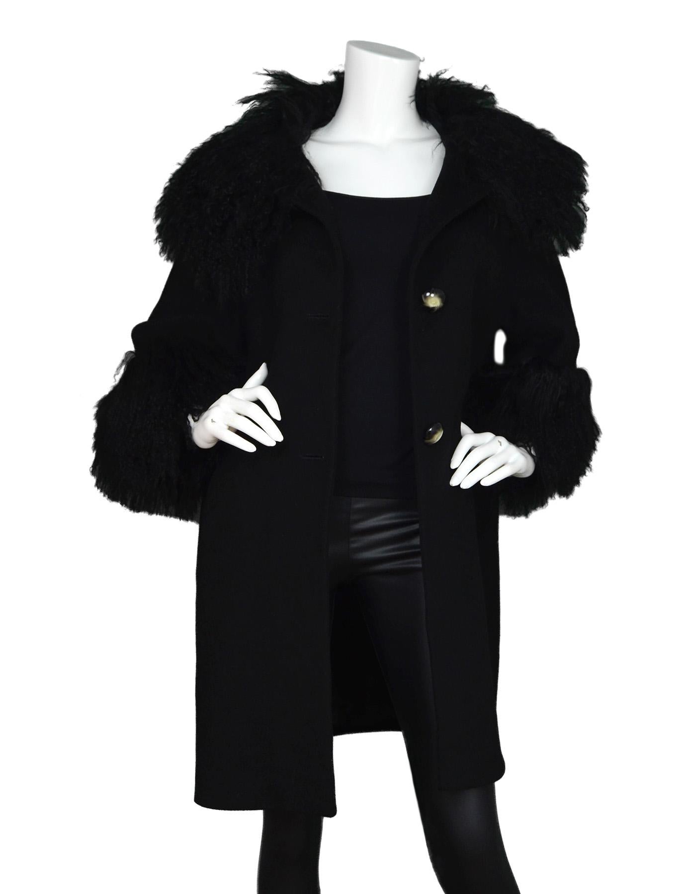 Trilogy Black Wool/Cashmere Coat W/ Lamb Fur Detail Sz 10

Made In: Italy
Color: Black
Materials: 80% wool, 20% cashmere
Opening/Closure: Button front
Overall Condition: Excellent pre-owned condition 

Measurements: 
Shoulder To Shoulder: 21