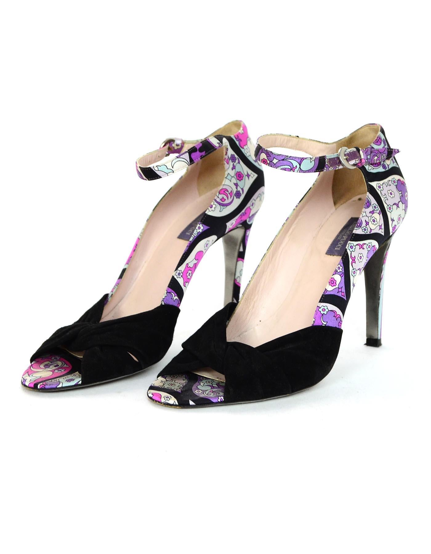 Emilio Pucci Printed Fabric Heels Shoes W/ Black Suede Sz 39

Made In: Italy
Color: Pink, purple, white, and black
Hardware: Silvertone
Materials: Fabric and suede
Closure/Opening:  Side ankle buckle
Overall Condition: Excellent pre-owned condition