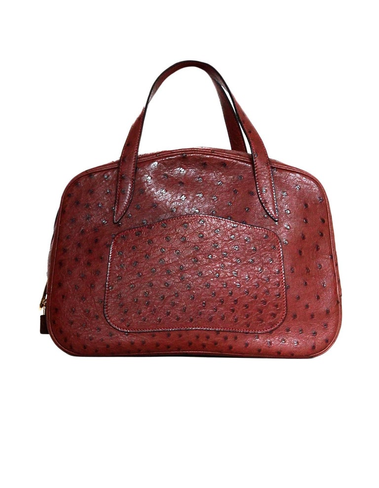 Hermes NEW Limited Edition Maroon Ostrich Doha Bag w/ Dust Bag, Lock and Key For Sale at 1stdibs