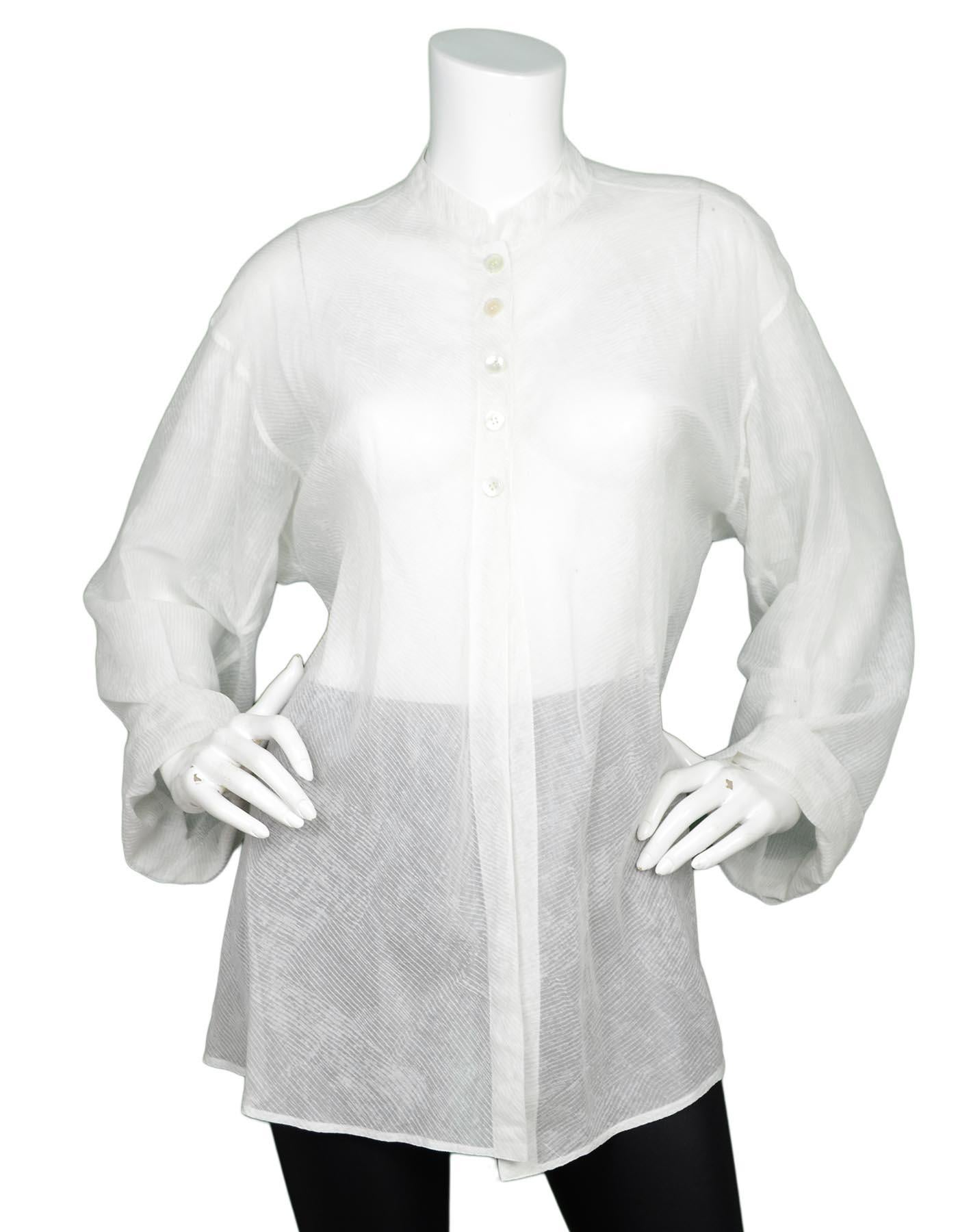 Alaia White Sheer Patterned Long Sleeve Blouse W/ Top Buttons Sz M

Color: White
Materials: No composition tag, linen 
Opening/Closure: Five buttons at top
Overall Condition: Excellent pre-owned condition with exception of no composition or size