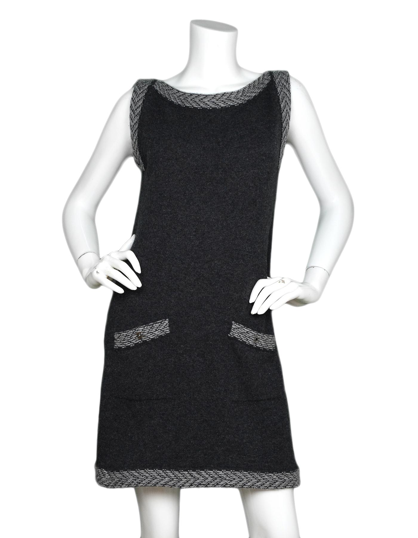 Chanel Grey Cashmere Knit Sleeveless Dress W/ CC Turnkey Pockets Sz 40

Made In: United Kingdom
Color: Grey
Materials: 100% cashmere
Opening/Closure: Pull over
Overall Condition: Very good pre-owned condition with exception of some soiling in front