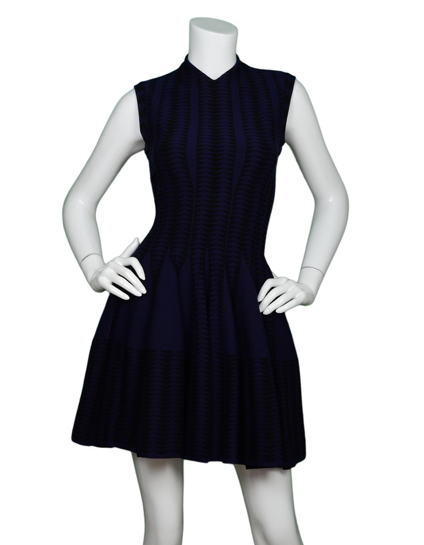 Alaia Navy/Black V-Neck Fit & Flare Cap Sleeve Dress Sz 38

Made In: Italy
Color: Navy/black
Materials: 42% wool, 36% viscose, 12% polyester, 8% nylon, 2% elastane 
Opening/Closure: Hidden back zipper
Overall Condition: Excellent pre-owned condition