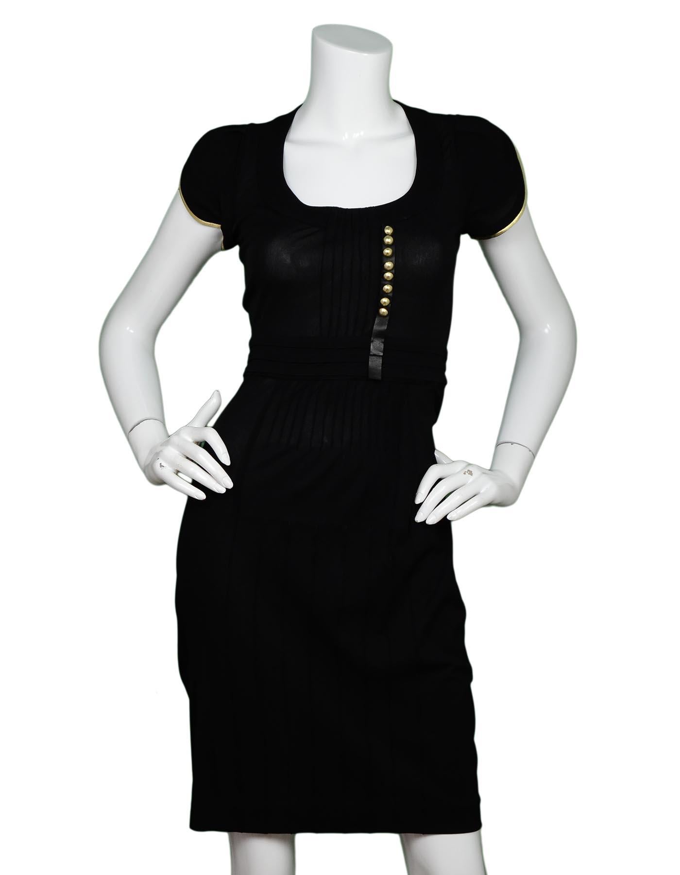 Prada Black Short Sleeve Dress W/ Pin Pleats & Gold Leather Trim Sz 38

Made In: Italy
Color: Black
Materials: 100% viscose
Opening/Closure: Hidden back zipper with hook eye at top
Overall Condition: Excellent pre-owned condition 

Measurements: