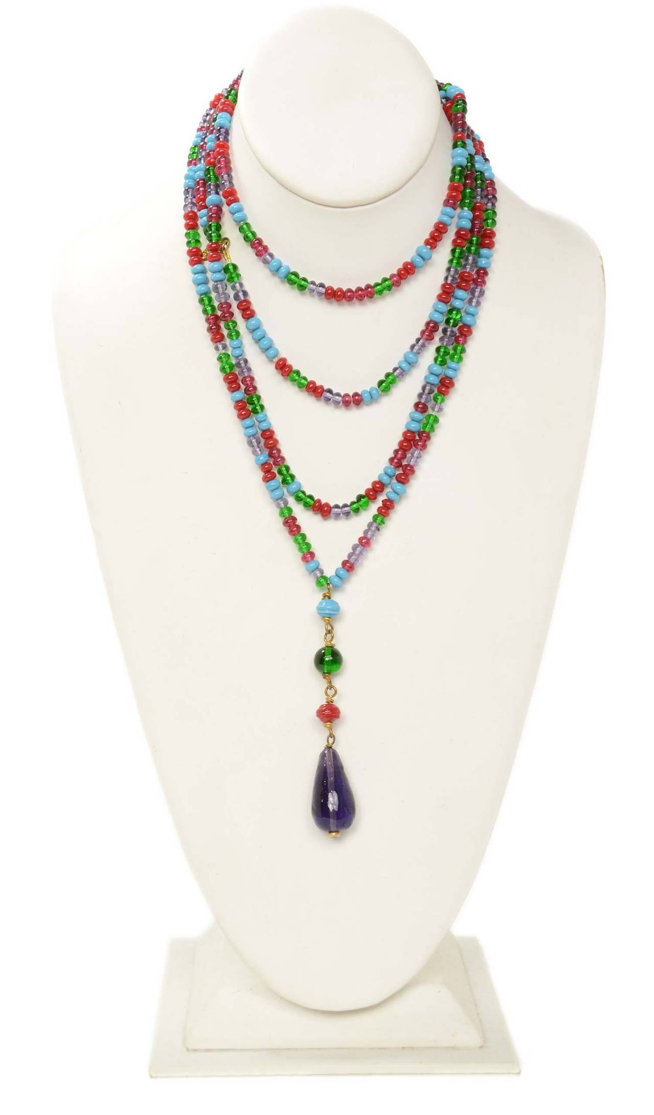 Chanel Vintage '94 Multi Colored Beaded NecklaceFeatures purple gripoix drop charm

    Made in: France
    Year of Production: 1994
    Stamp: 94 CC P
    Closure: Pull over
    Color: Turquoise, red, purple, green, and brass
    Materials: