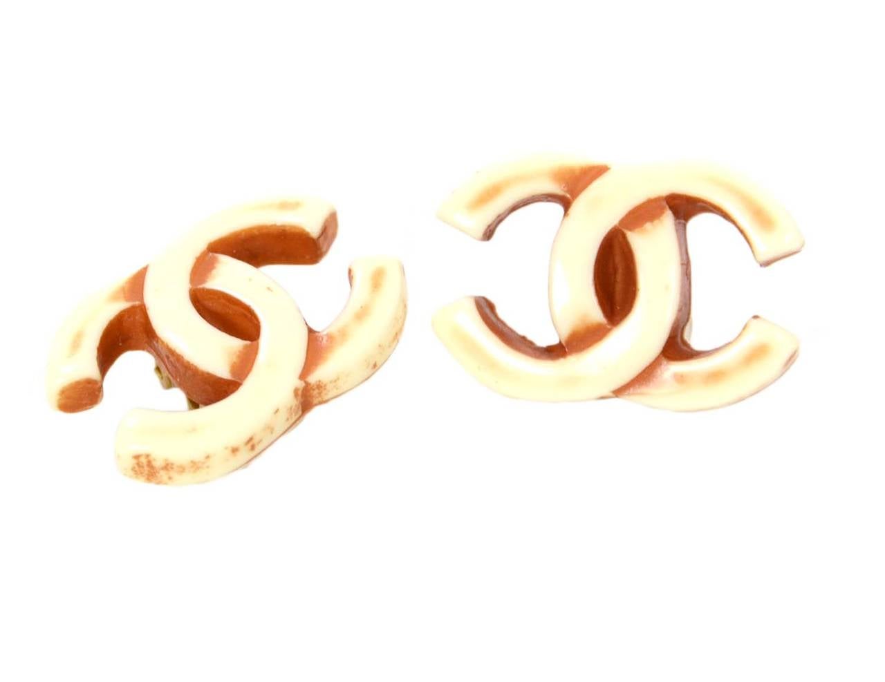 Chanel '01 Ivory Resin CC Clip On Earrings
Earrings look very chic when paired with matching ivory resin bangle (see in Chanel Jewelry on the site)

    Made in: France
    Year of Production: 2001
    Stamp: 01 CC P
    Closure: Clip on
   