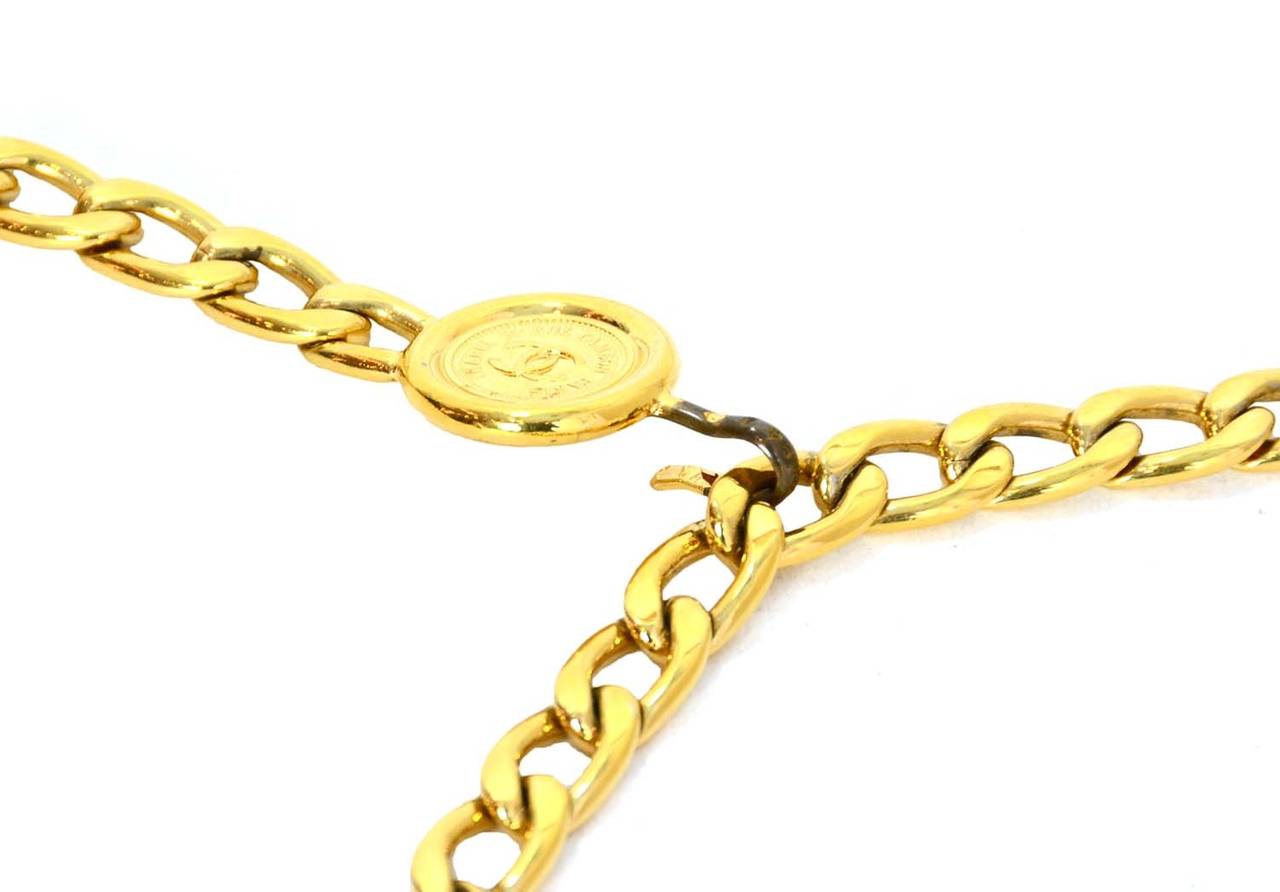 Chanel Vintage '94 Gold Chain Belt w/Two Chanel Coins

    Made in: Not given- believed to be France
    Year of Production: 1994
    Stamp: CHANEL CC 94 A
    Color: Gold
    Composition: Metal
    Closure/opening: Hook
    Overall