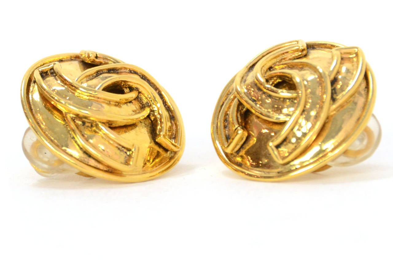 Chanel Vintage '94 Gold CC Clip On Earrings

    Made in: France
    Year of Production: 1994
    Stamp: 94 CC P
    Closure: Clip on
    Color: Goldtone
    Materials: Metal
    Overall Condition: Excellent with no visible signs of wear or