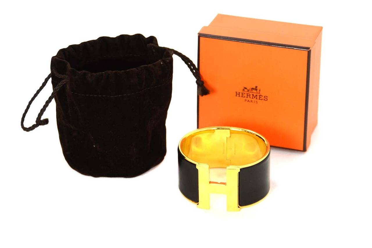 HERMES Black and Gold Extra-Wide Clic-Clac H Bracelet GM In Excellent Condition In New York, NY