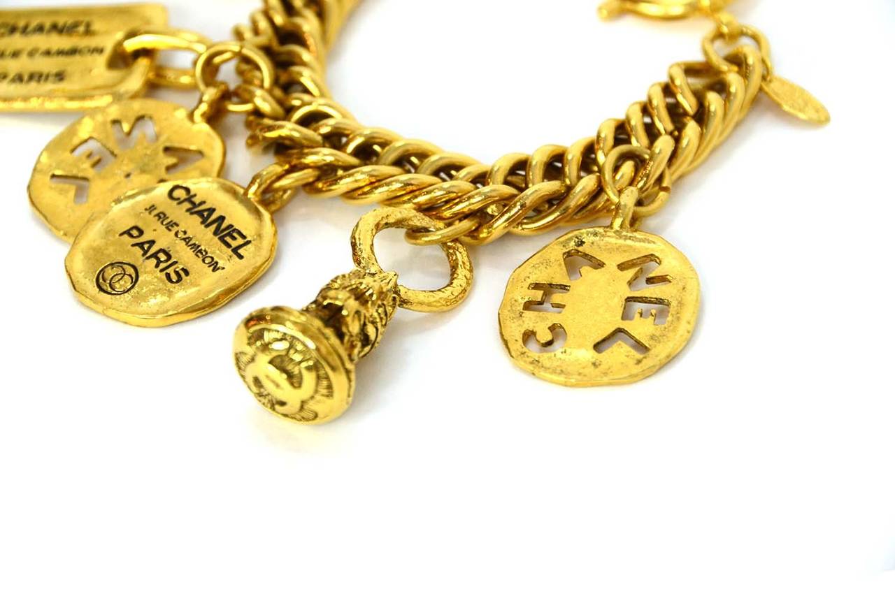 Chanel Vintage '90-'92 Gold Charm Bracelet
Features 