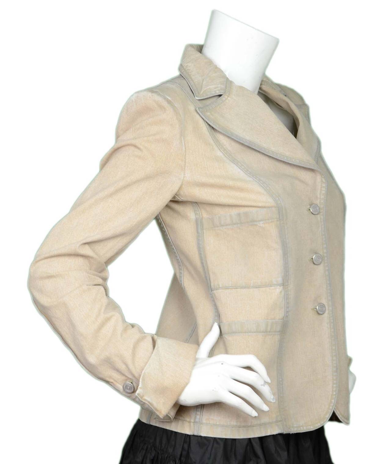 Chanel '02 Beige Denim Blazer w/White Buttons sz 38

    Made in: Italy
    Year of Production: 2002
    Color: Beige
    Composition: 90% denim, 10% spandex
    Lining: None
    Closure/opening: Single breasted closure
    Exterior Pockets: