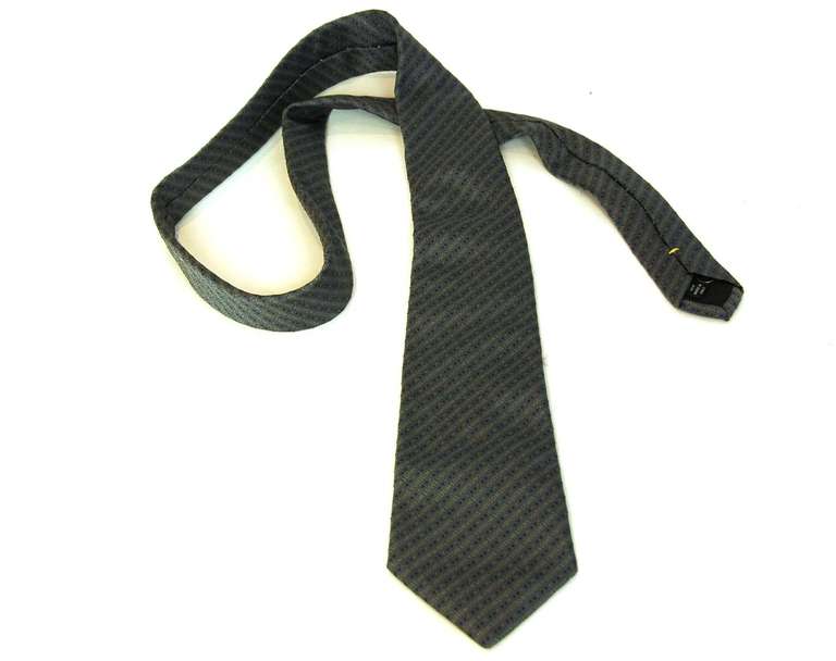 Louis Vuitton Grey Silk Logo Tie

    Made in Italy
    Composition: 100% silk
    Labeled 
