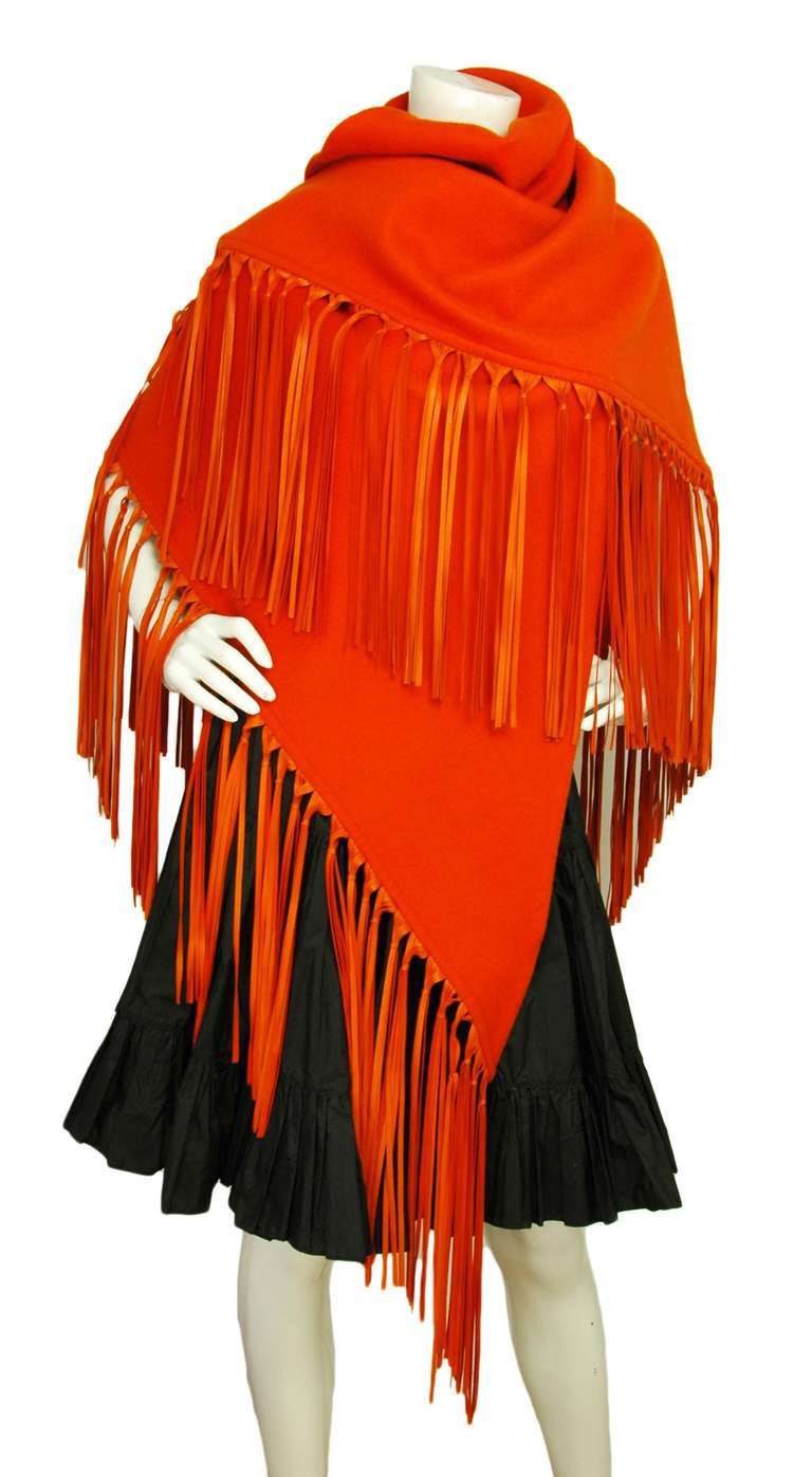 Hermes Cashmere and Lambskin Fringe Shawl
Made in France
100% woven Cashmere with 100% Lambskin leather fringe trim
Knotted leather fringes adorn the entire length of the shawl
Leather tag stamped 'HERMES PARIS MADE IN FRANCE'
Current retail is