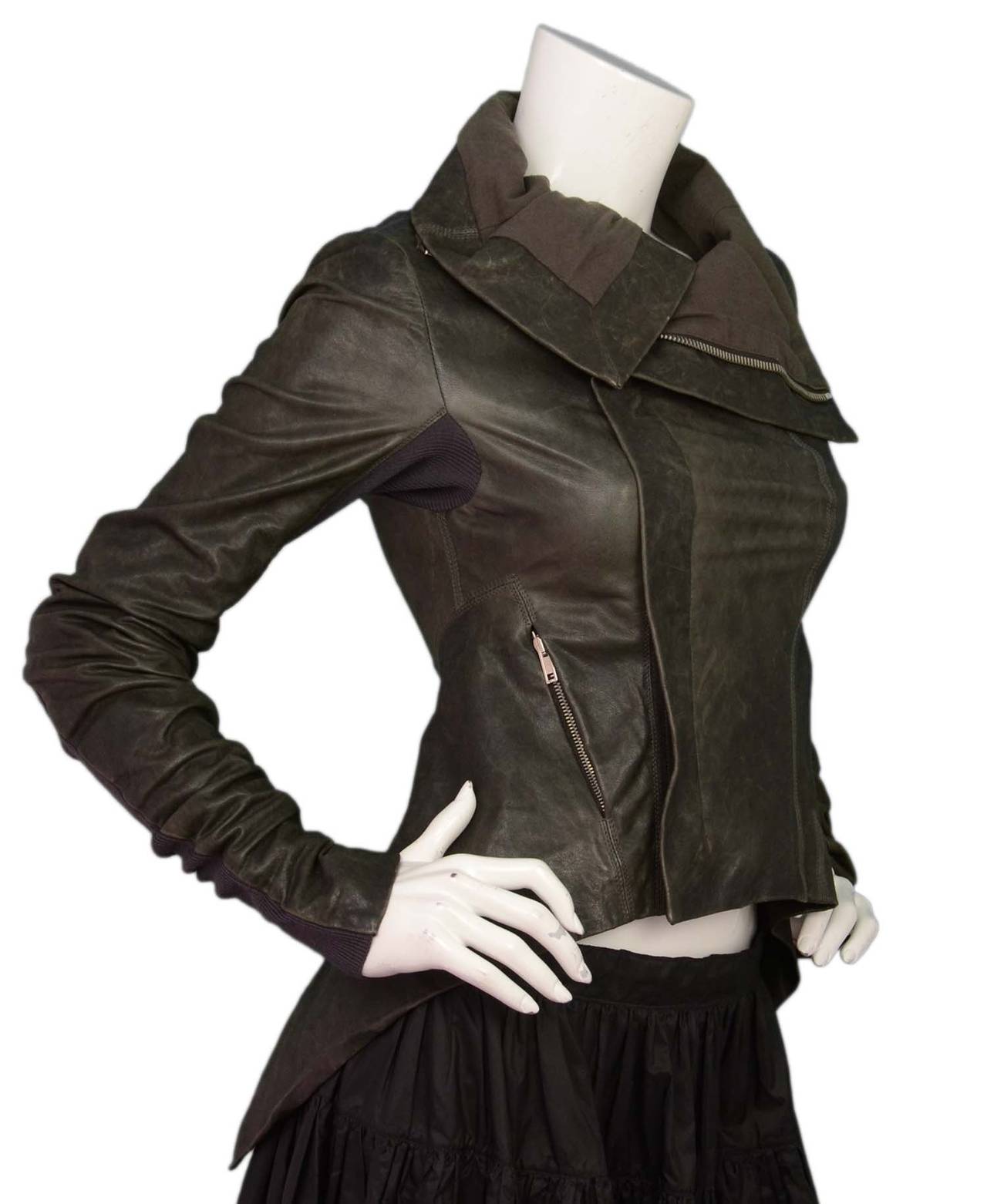 Rick Owens Brown Distressed Leather Waterfall Front Jacket
Features asymmetrical hemline

    Made in: Italy
    Color: Brown
    Composition: 90% leather, 10% wool
    Lining: Brown, 60% cotton, 40% rayon
    Closure/opening: Front diagonal
