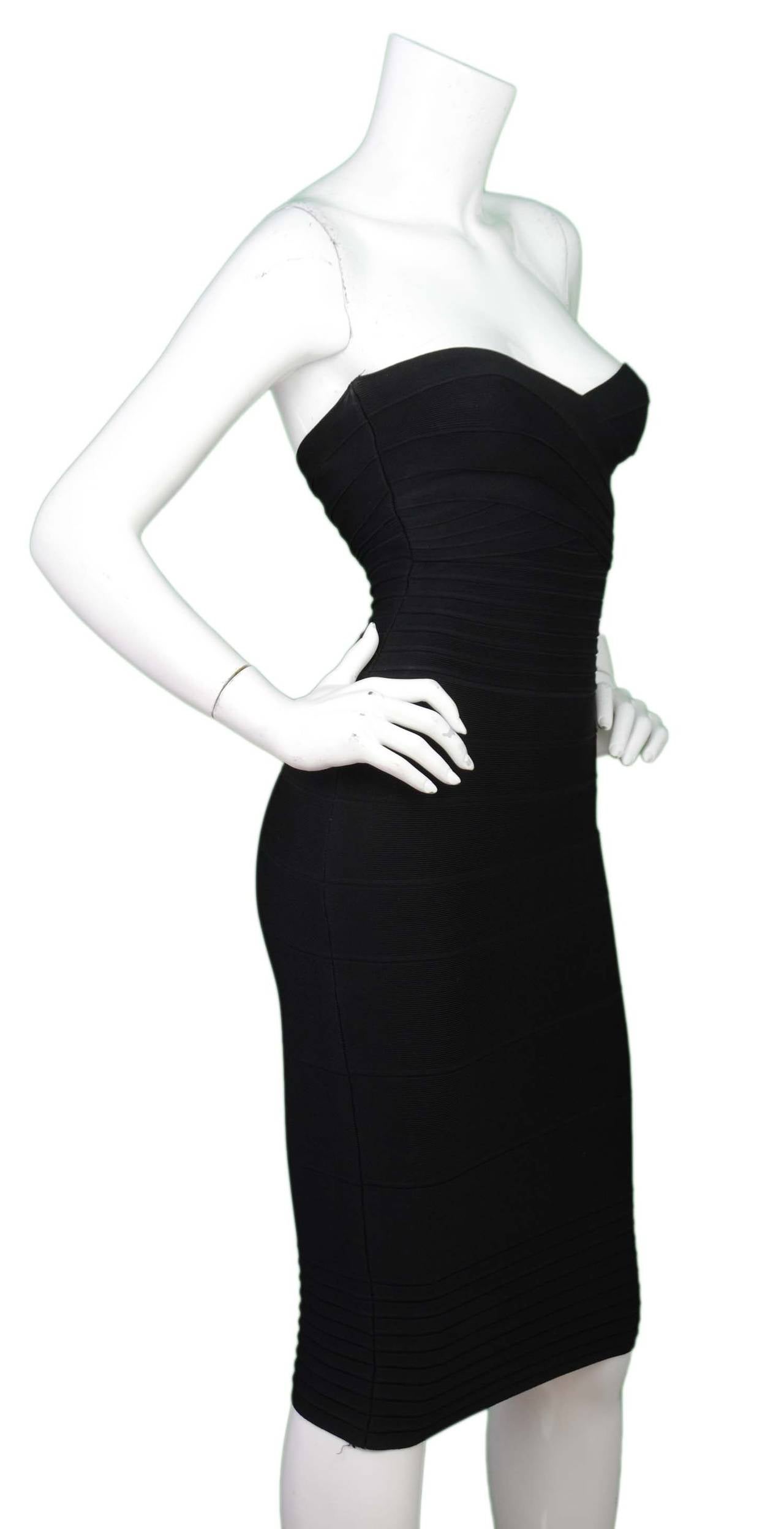 Herve Leger Black Strapless Bandage Dress
Features a sweetheart neckline

    Made in: China
    Color: Black
    Composition: 90% rayon, 9% nylon, 1% spandex
    Lining: None
    Closure/opening: Back center zipper
    Exterior Pockets: