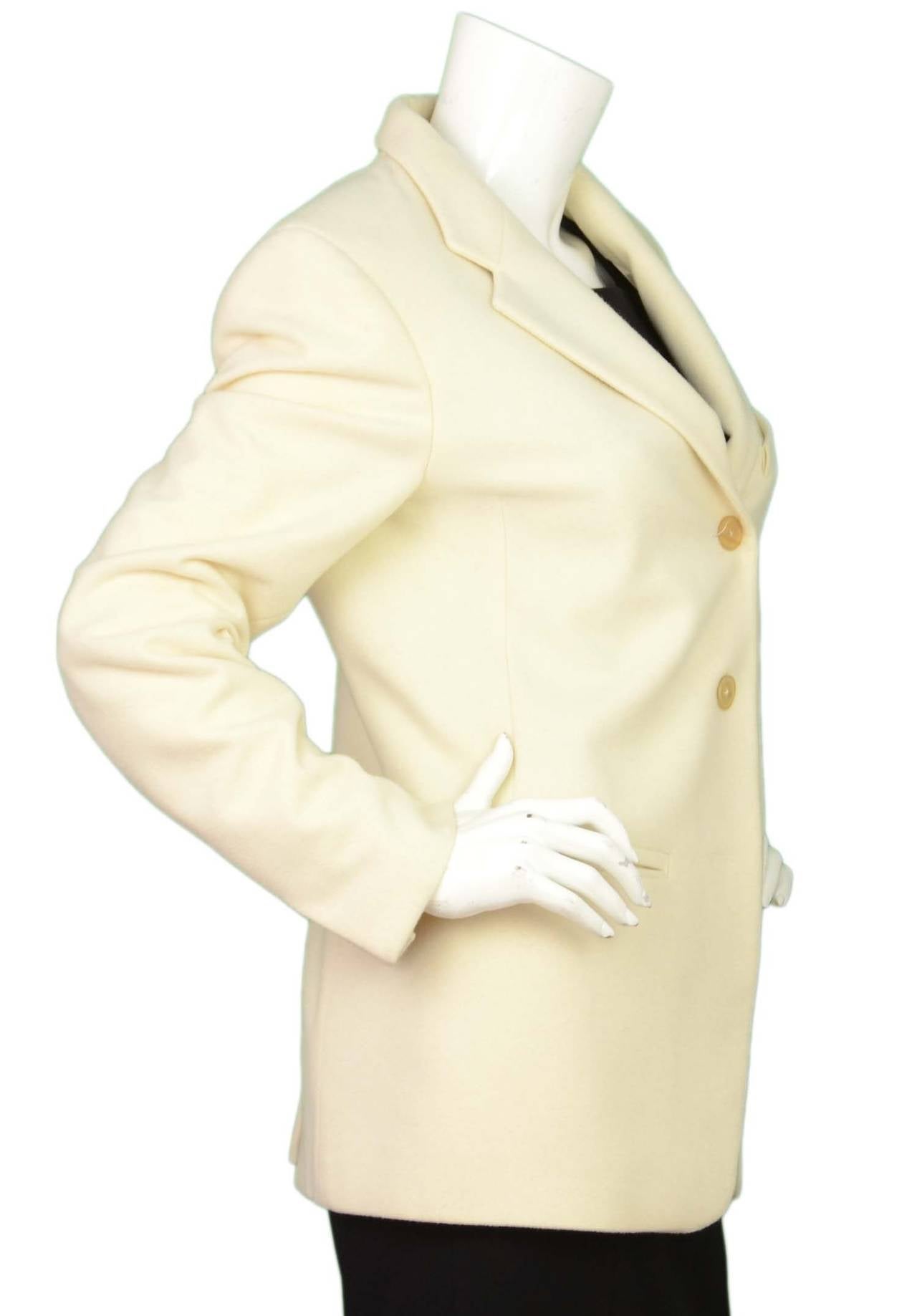 Jil Sander Ivory Cashmere Single Breasted Jacket

    Made in: Germany
    Color: Ivory
    Composition: 100% Cashmere
    Lining: Ivory, 55% silk, 45% cupro
    Closure/opening: Single breasted button front
    Exterior Pockets: One stand