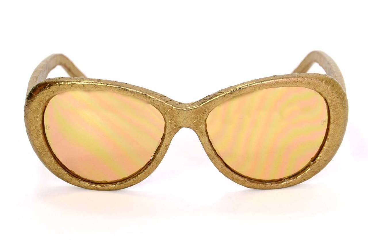 Linda Farrow Gold Snakeskin Cat Eye Sunglasses
Features fully wrapped dull gold snakeskin throughout

    Made in: Japan
    Stamp: Left arm: 58 Square 16-140 Right arm: LFL/244/9
    Color: Gold
    Materials: Snakeskin
    Overall