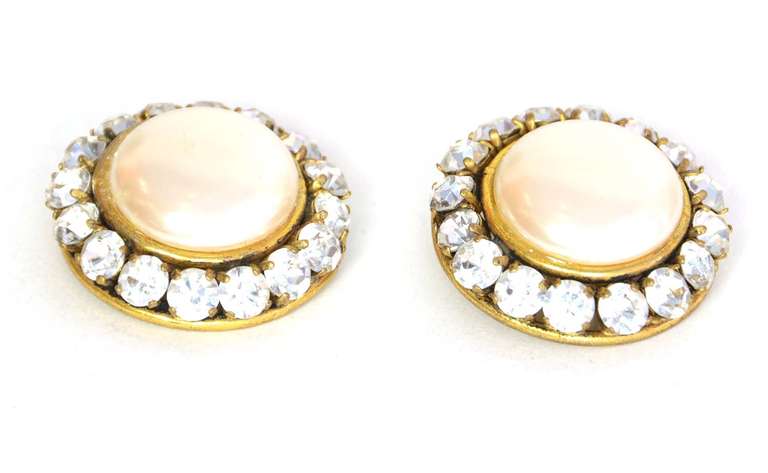 Chanel Clip On Faux Pearl And Rhinestone Earrings

    Made in France
    Materials: goldtone metal, rhinestones, faux pearls
    Stamped 