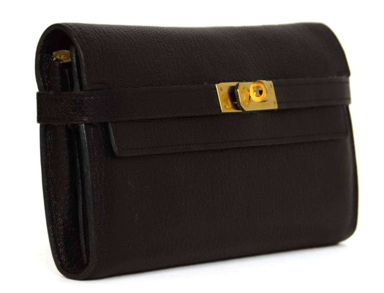 Hermes Black Chevre Kelly Wallet

    Made in: France
    Year of Production: 2008
    Color: Black and goldtone
    Hardware: Goldtone
    Materials: Chevre leather and metal
    Lining: Black chevre leather
    Closure/opening: Flap top