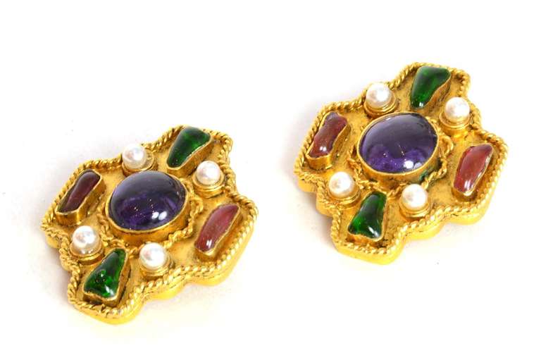 Chanel Vintage '86 Multi-Colored Gripoix & Pearl Clip On Earrings

Made In: France
Year of Production: 1986
Color: Goldtone, purple, red, green and ivory
Materials: Metal, gripoix and faux pearls
Stamp: 2 CC 3
Closure: Clip on
Overall Condition: