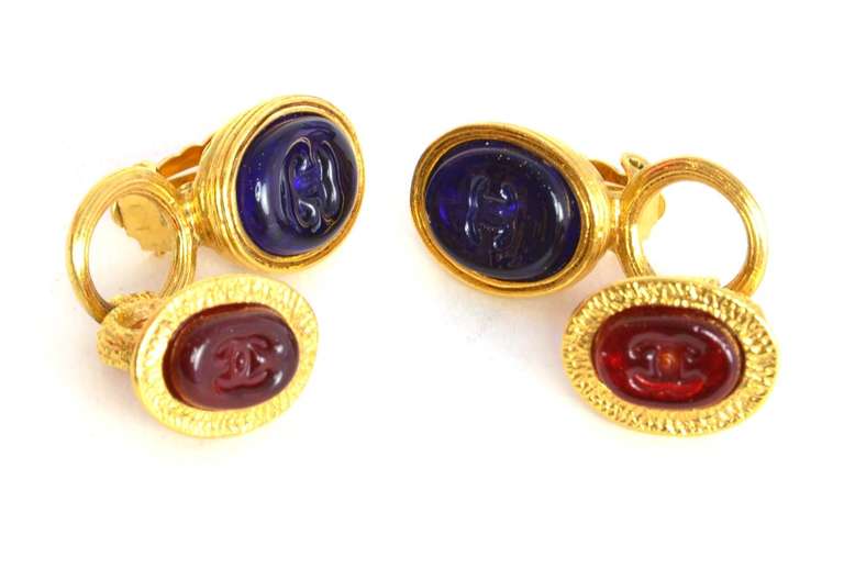 Chanel Vintage '93 Gripoix & Gold Dangling Clip On Earrings

Made In: France
Year of Production: 1993
Stamp: 93 CC A
Color: Blue, red and goldtone
Materials: Metal and poured glass
Closure: Clip on
Overall Condition: Excellent preowned