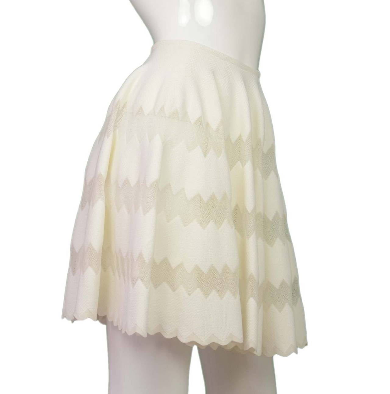 Alaia White Knit Zig Zag Skater Skirt
Features knitted zig zag design throughout
Made in: Italy
Color: White
Composition: 50% viscose, 40% silk, 10% polyester
Lining: White, 100% silk
Closure/opening: Center back zipper
Exterior Pockets: