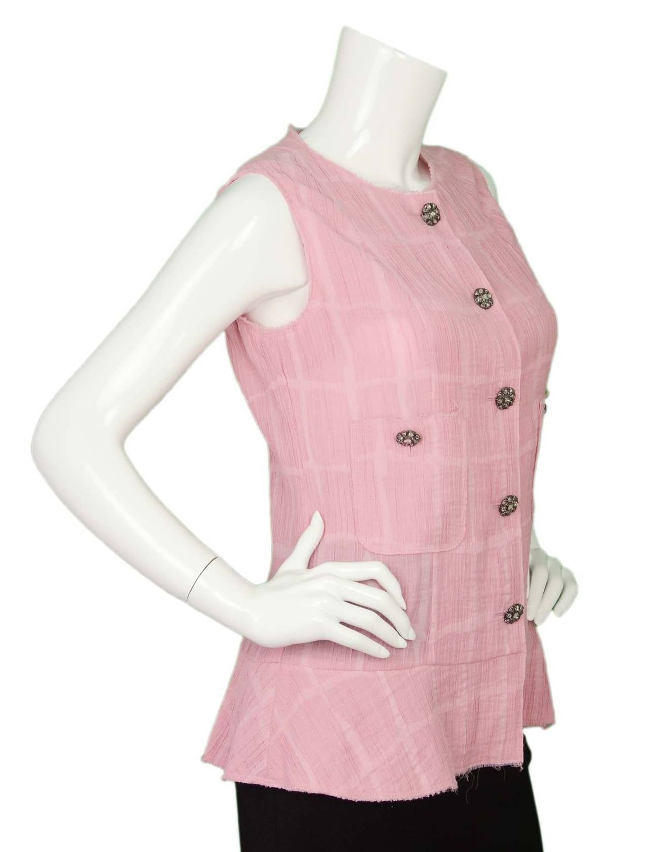 Chanel Pale Pink Dropped Waist Vest/Tunic
Features silvertone and poured glass buttons
Made in: France
Color: Pale pink 
Composition: 48% cotton, 32% rayon, 20% nylon
Lining: None
Closure/opening: Front center button up
Exterior Pockets: Two