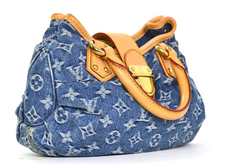 Louis Vuitton Denim Monogram PLEATY Bag Rt. $1,420

    Age: c. 2005
    Made in France
    Materials: denim, leather, goldtone metal
    Features one interior slip pocket and gathered sides
    Flap over and push in lock
    Blind date