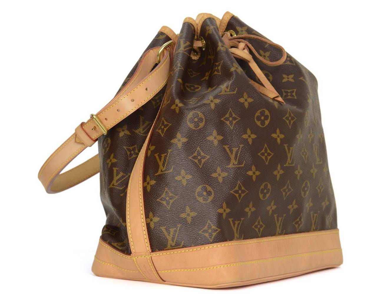 Louis Vuitton Monogram Canvas Noe Drawstring Bag
Features adjustable shoulder strap
Made in: France
Year of Production: 2011
Color: Brown, tan and goldtone
Hardware: Goldtone
Materials: Coated canvas, leather and metal
Lining: Brown