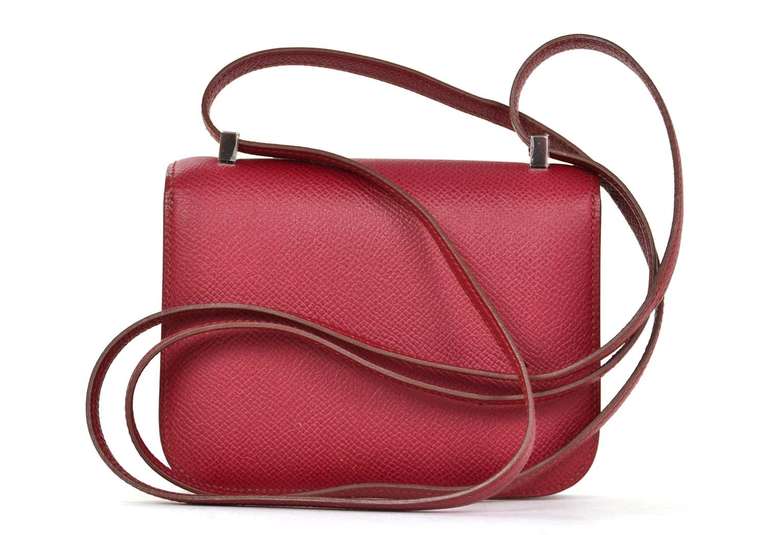 Hermes Rubis Red Epsom Leather 14 CM CONSTANCE MICRO Bag

Age: c. 2010

Made in France

Materials: epsom leather, silvertone metal

Features standard 