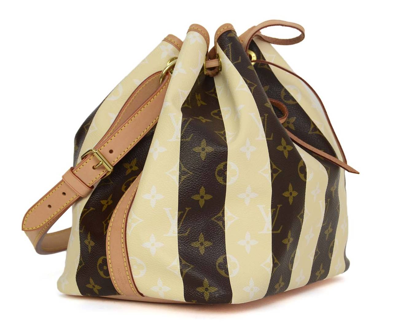 Louis Vuitton Monogram Rayures Canvas Ltd Ed. Noe Bag
Made in: France
Year of Production: 2011
Color: Brown, tan, ivory and gold
Hardware: Goldtone
Materials: Coated canvas, leather and metal
Lining: Ivory striped textile
Closure/opening: