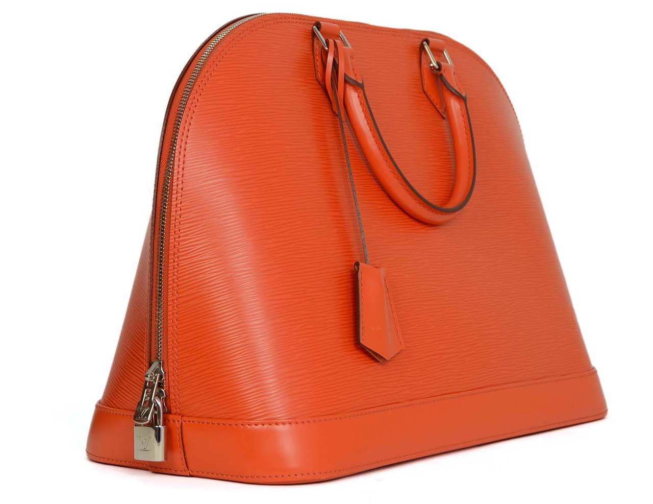Louis Vuitton Orange Epi Alma GM Bag
Made in: France
Year of Production: 2012
Color: Orange
Hardware: Silvertone
Materials: Epi leather and metal
Lining: Orange suede
Closure/opening: Zip around closure
Exterior Pockets: None
Interior