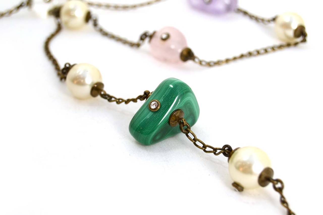 Chanel Vintage '97 Brass & Multi-Colored Stone Necklace
Stone pendants feature small rhinestones in center
Made in: France
Year of Production: 1997
Stamp: 97 CC A
Closure: Hook and eye closure
Color: Brass, green, pink, blue and
