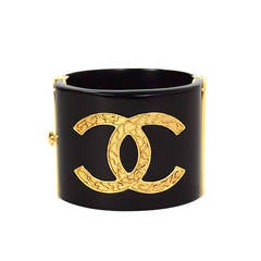 CHANEL Black Resin 
Goldtone Cuff Bracelet