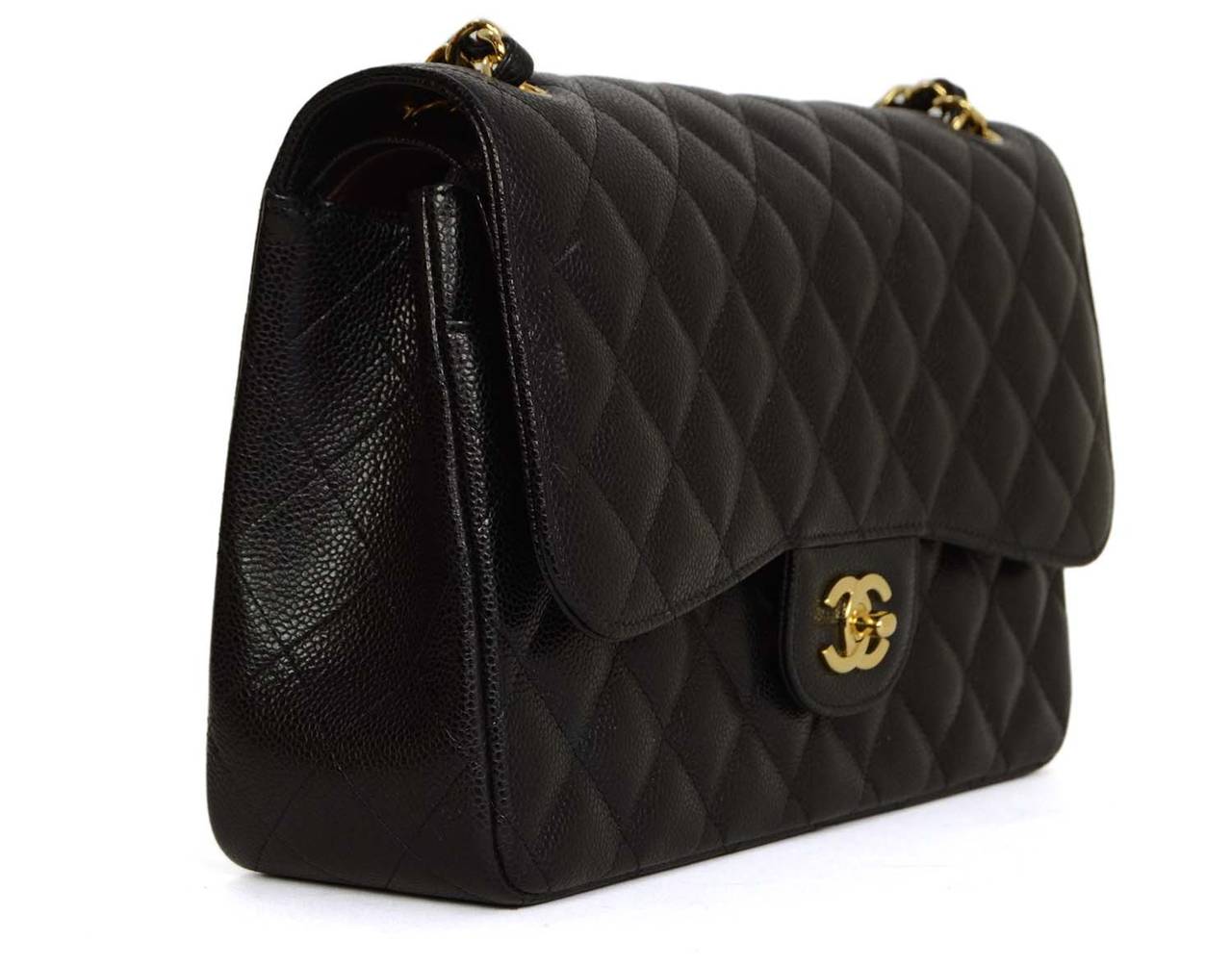 Chanel Black Quilted Caviar Jumbo Classic Double Flap Bag
Features adjustable shoulder strap
Made in: Italy
Year of Production: 2014
Color: Black and goldtone
Hardware: Goldtone
Materials: Caviar leather and metal
Lining: Black and burgundy