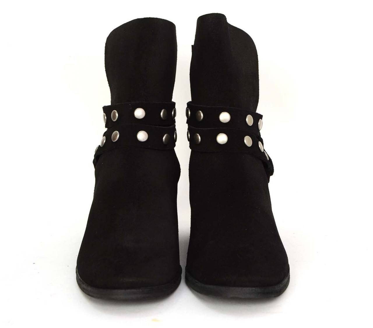 See By Chloe Black Suede Ankle Booties
Features silvertone studs throughout
Made in: Italy
Color: Black and silvertone
Composition: Suede and metal
Sole Stamp: See by Chloe 37 1/2 Vero Cuoio
Closure/opening: Buckle on outside ankles
Overall