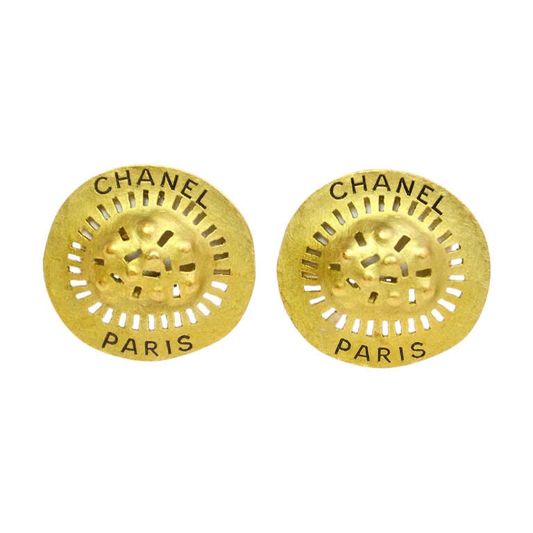CHANEL Goldtone Round Earrings W/Cutouts & "CHANEL PARIS" Print