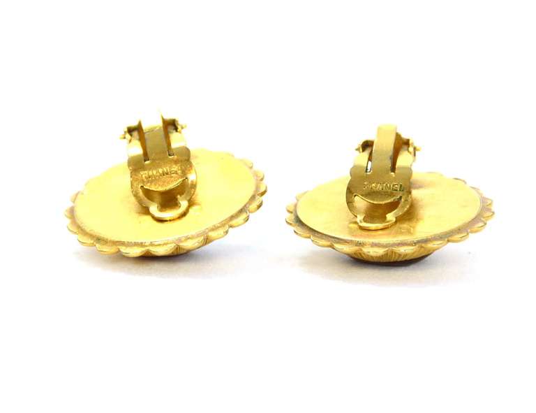 CHANEL Goldtone Clip On Earrings With Red Gripoix Center Stone In Excellent Condition In New York, NY